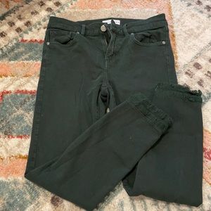 Forest green jeans chew hem skinny